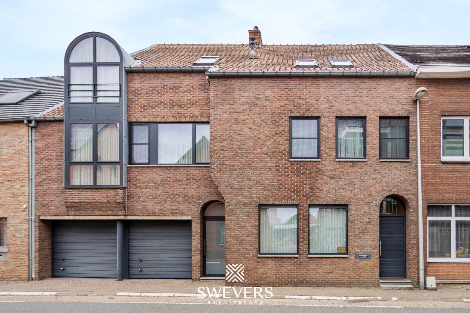 Ruime woning met tal van mogelijkheden in het hart van Tessenderlo-Ham foto {{pictureIndex}}
