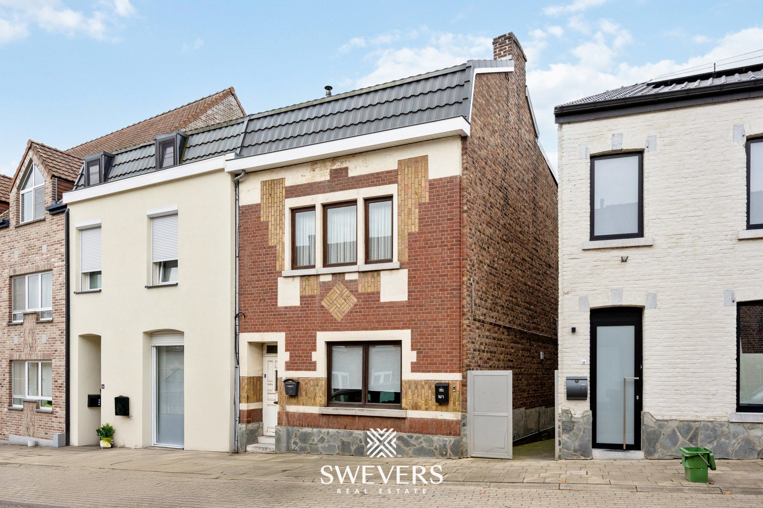 Hoofdfoto van de publicatie: Tweewoonst met tuin, ideaal voor investering of duo-wonen