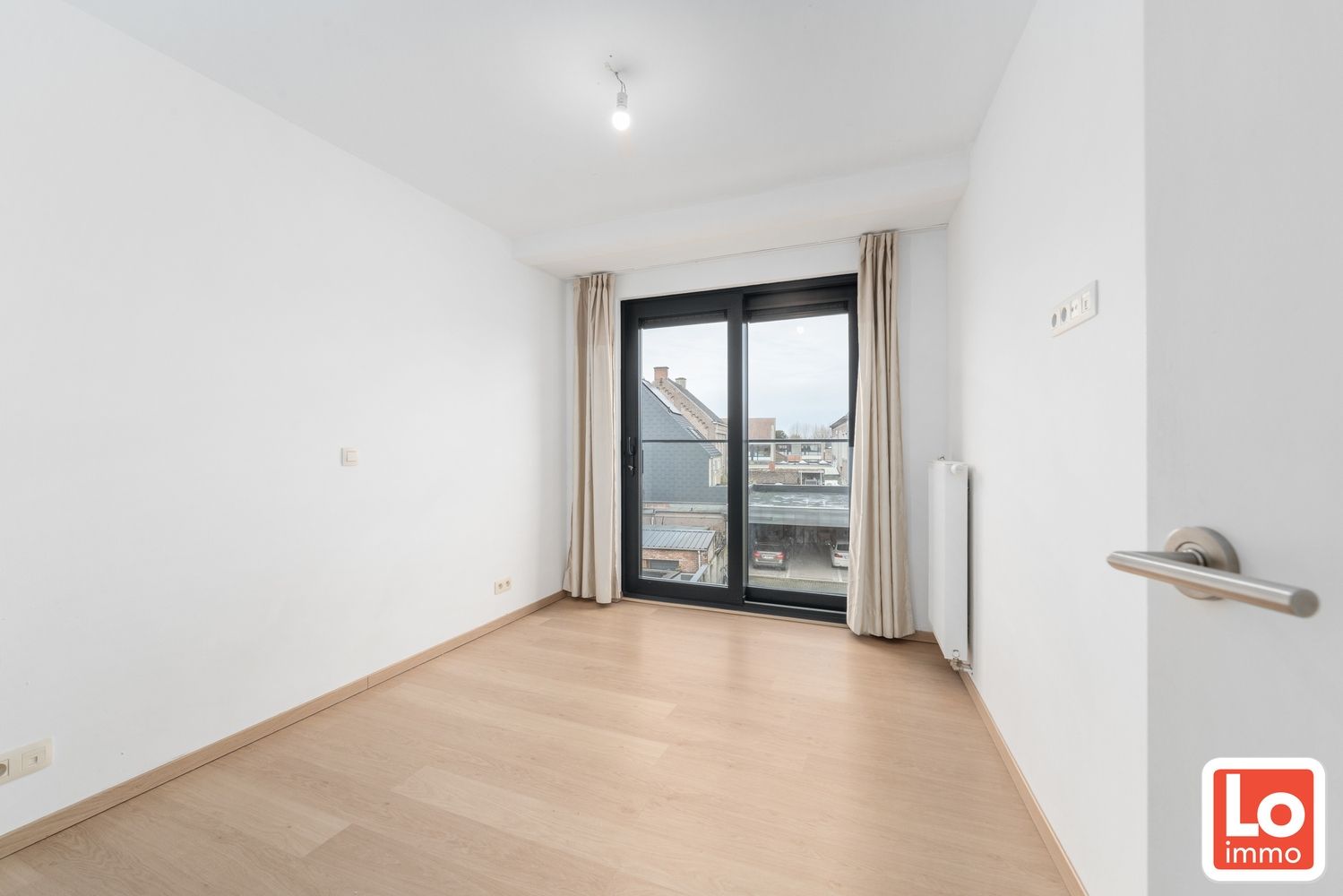 Mooi appartement met 2 slaapkamers, zuid-gericht terras en autostaanplaats in Centrum Lochristi foto 9