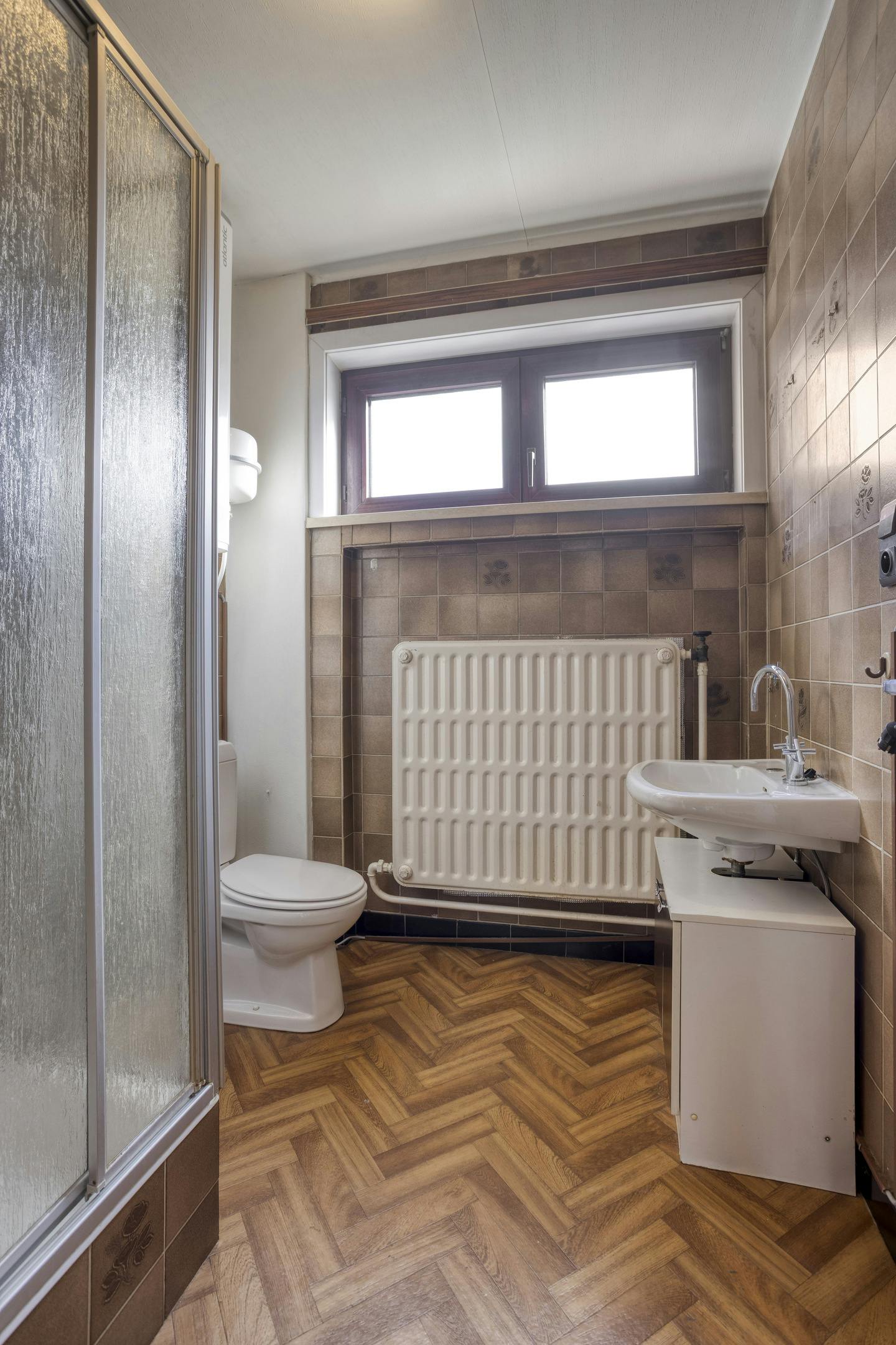 Te renoveren woning met potentieel in Sint-Agatha-Berchem! foto 8