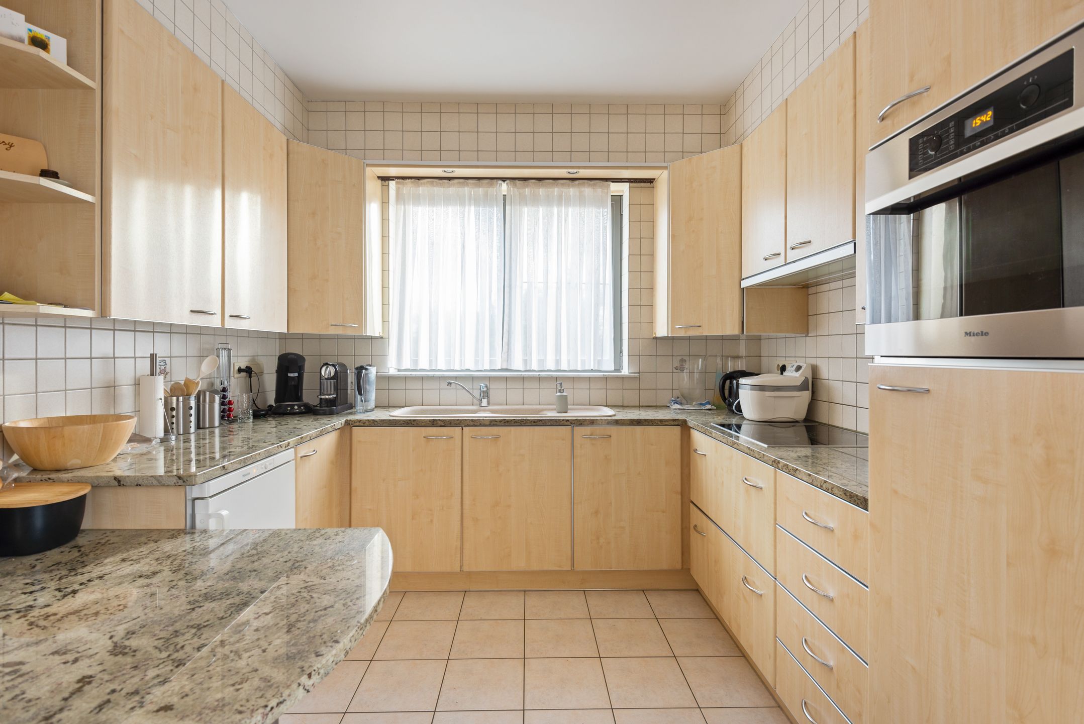 Opbrengsteigendom met 3 appartementen + garageboxen in Wommelgem te koop! foto 19