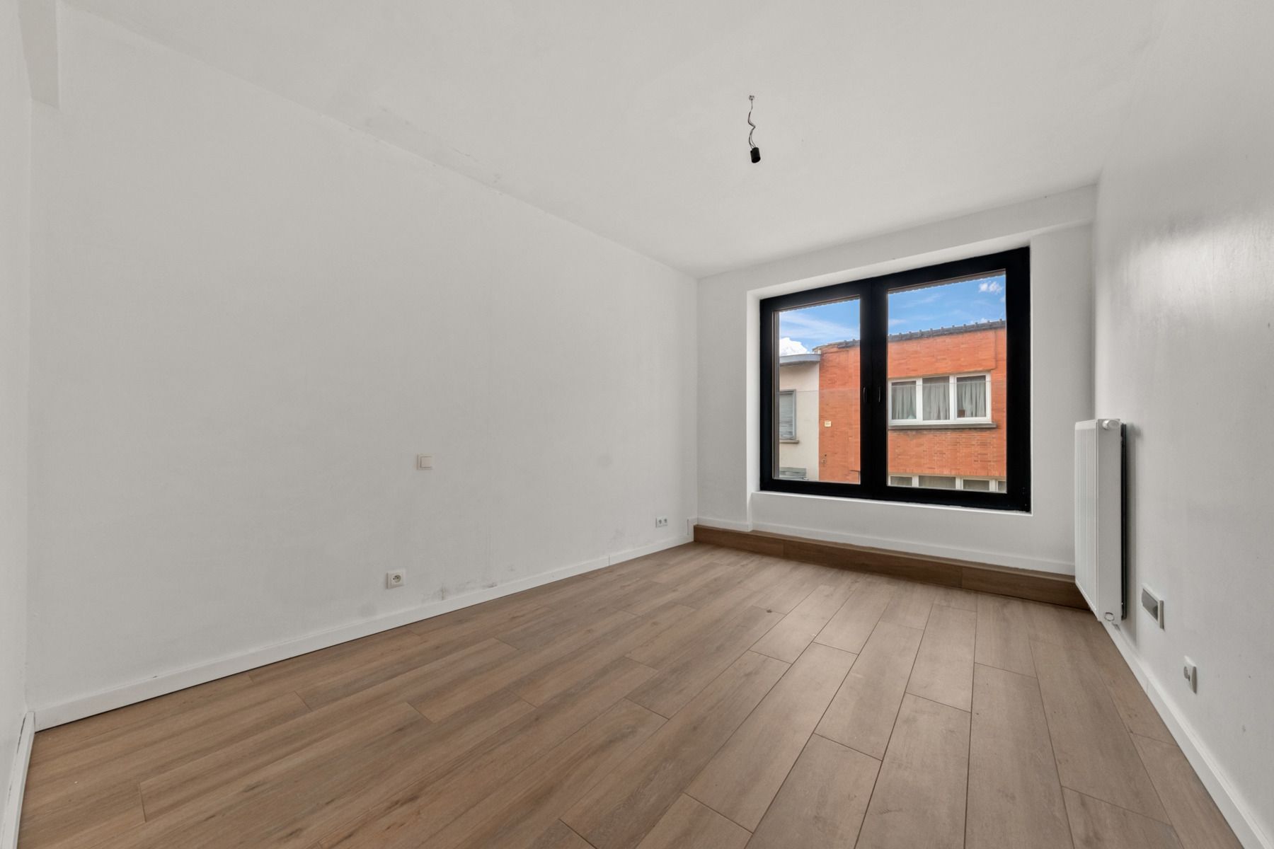 Centraal gelegen recent appartement met 2 slaapkamers foto 6