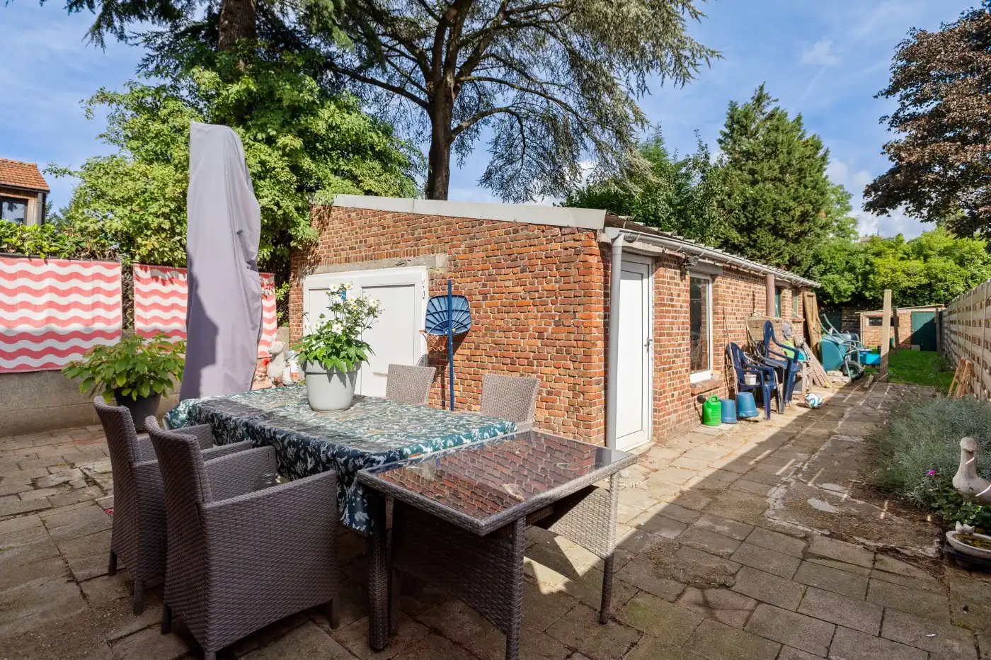 Toffe halfopen ééngezinswoning met 2 slpk., garage/werkplaats én ruime tuin foto 15