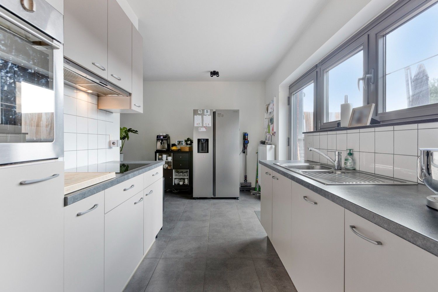 Instapklare en lichtrijke duplex met terras, garage én drie slaapkamers foto 14