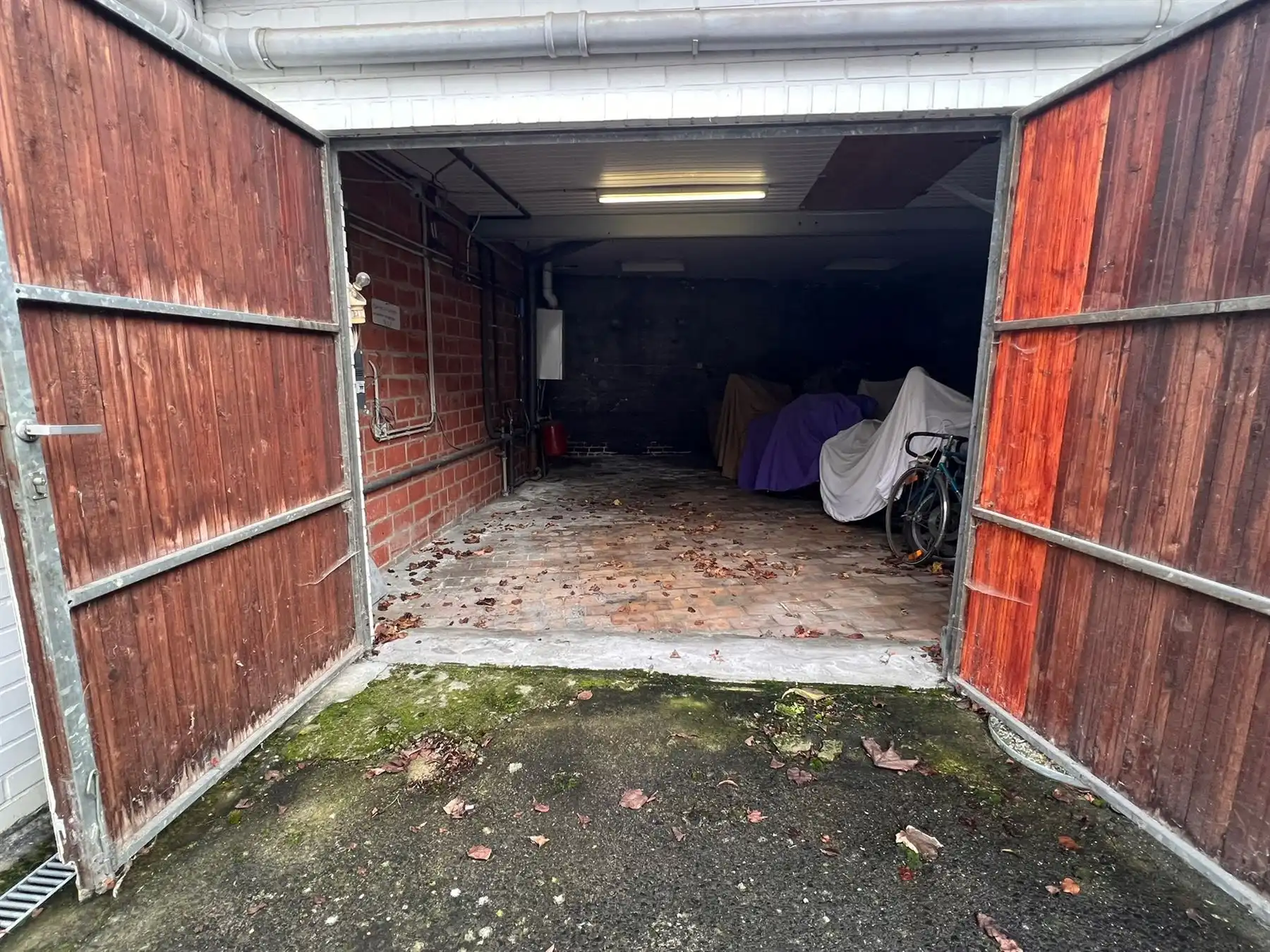 Garage foto {{pictureIndex}}