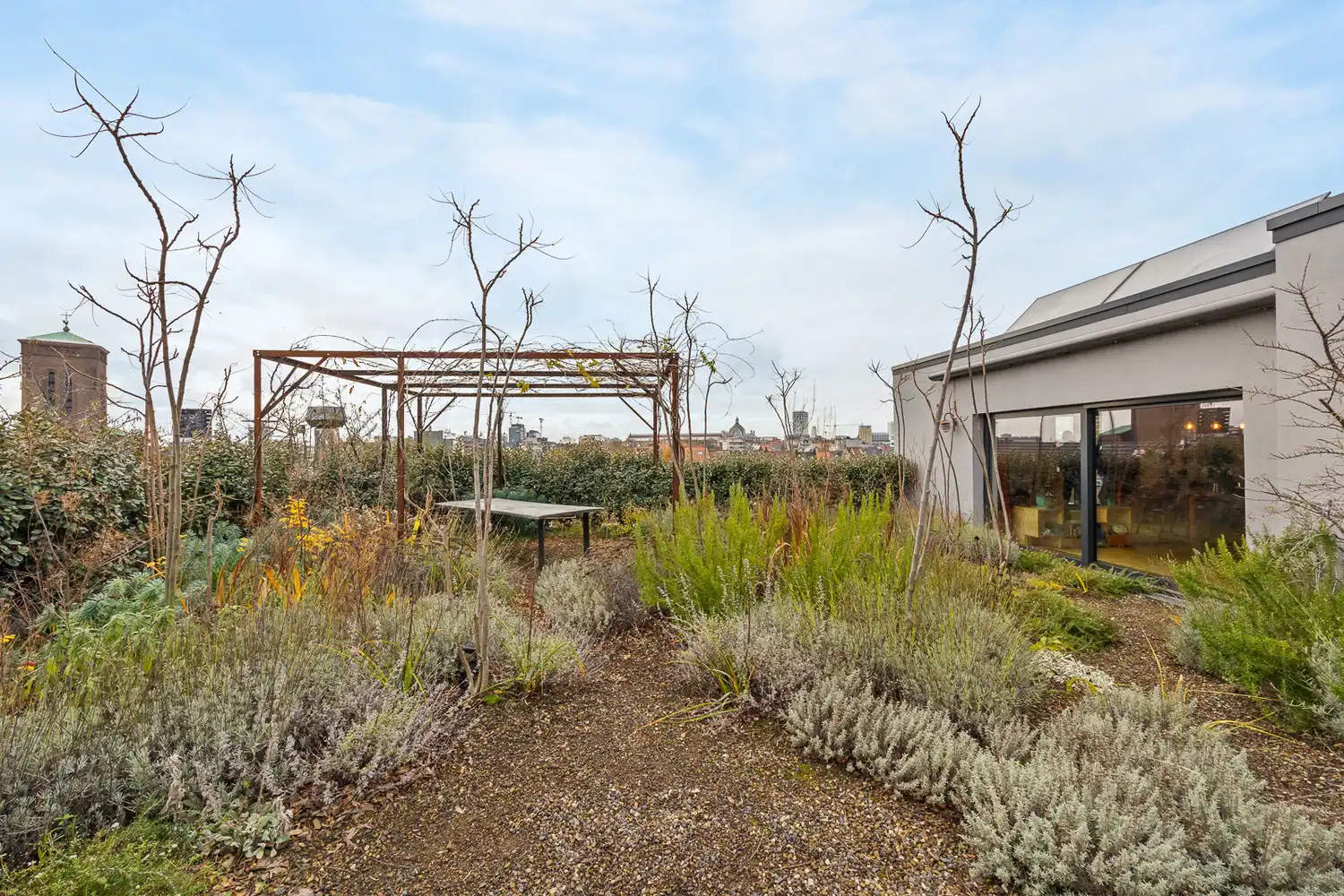 Een woning in de lucht: 'Uitzonderlijke loft 200m² + aangelegde daktuin, terras en 2 optionele garages in rustig, groen woonerf op de grens Borgerhout/Antwerpen' foto 29