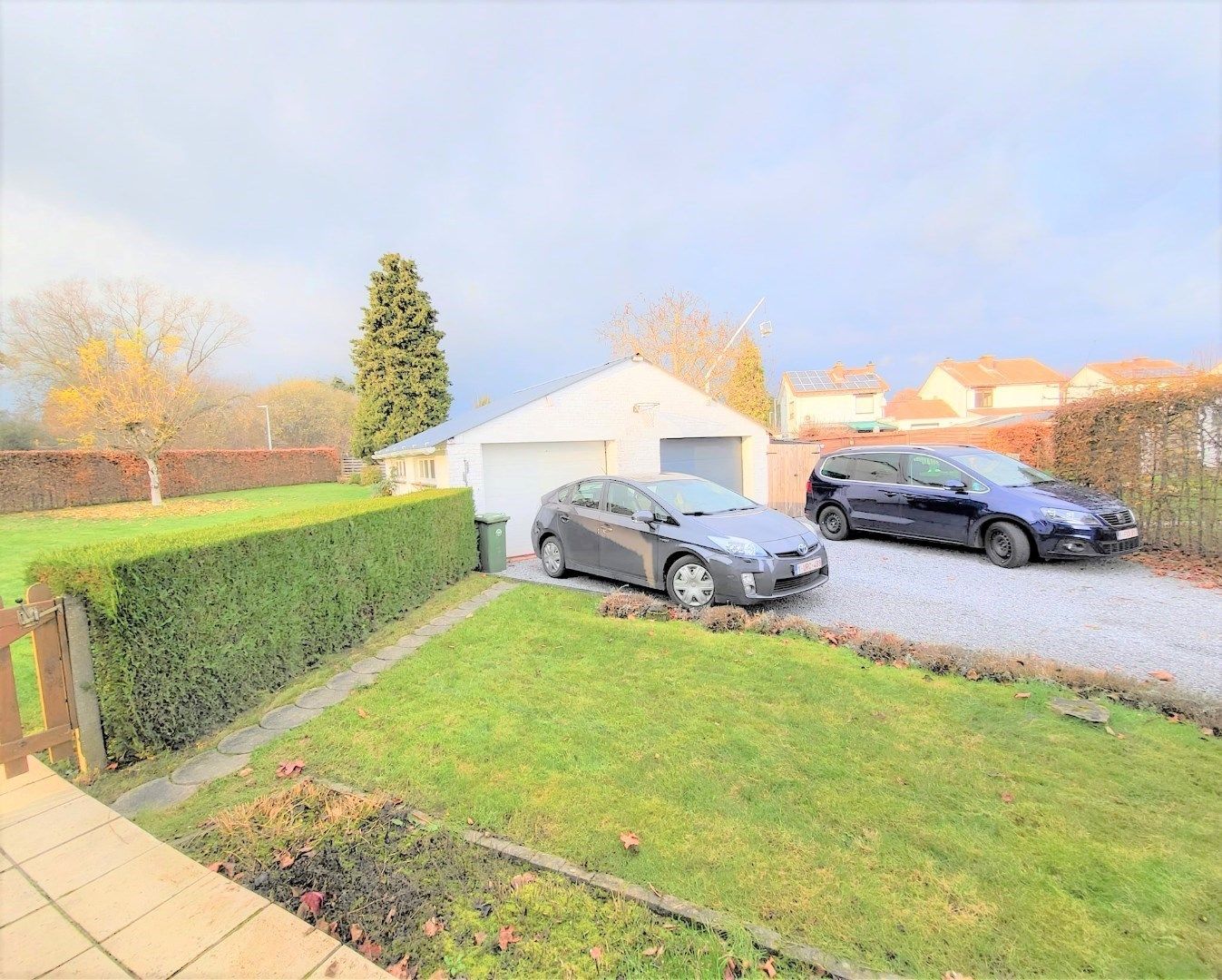 Halfopen bebouwing met garage en schitterende tuin. foto 18