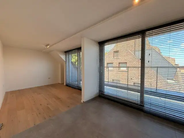Luxe duplexappartement te huur in het hart van Maaseik, met lift, 2 slaapkamers en 2 terrassen.  foto 18