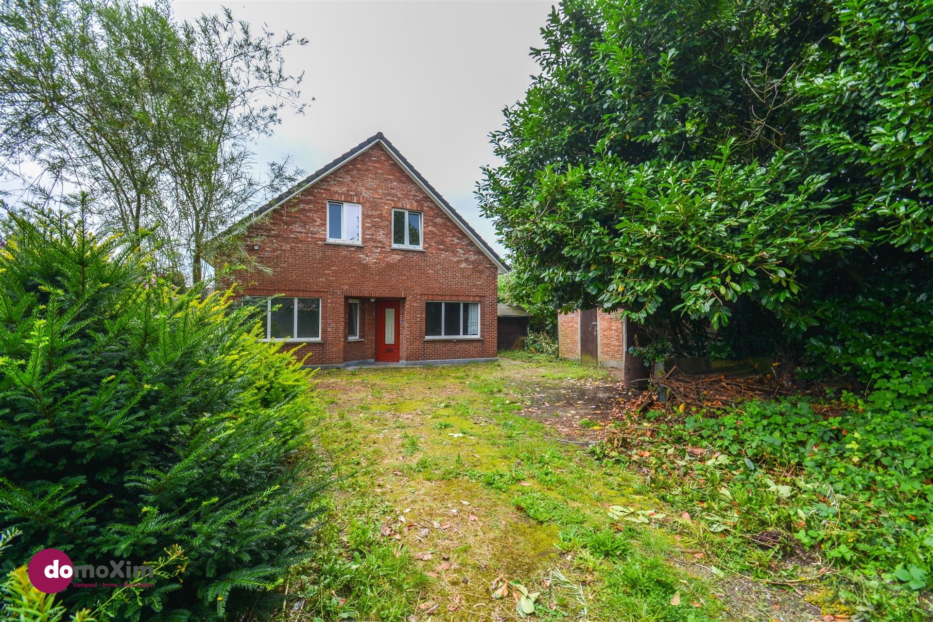 Centraal gelegen jaren '50 woning met leuke tuin in Boortmeerbeek  foto 2