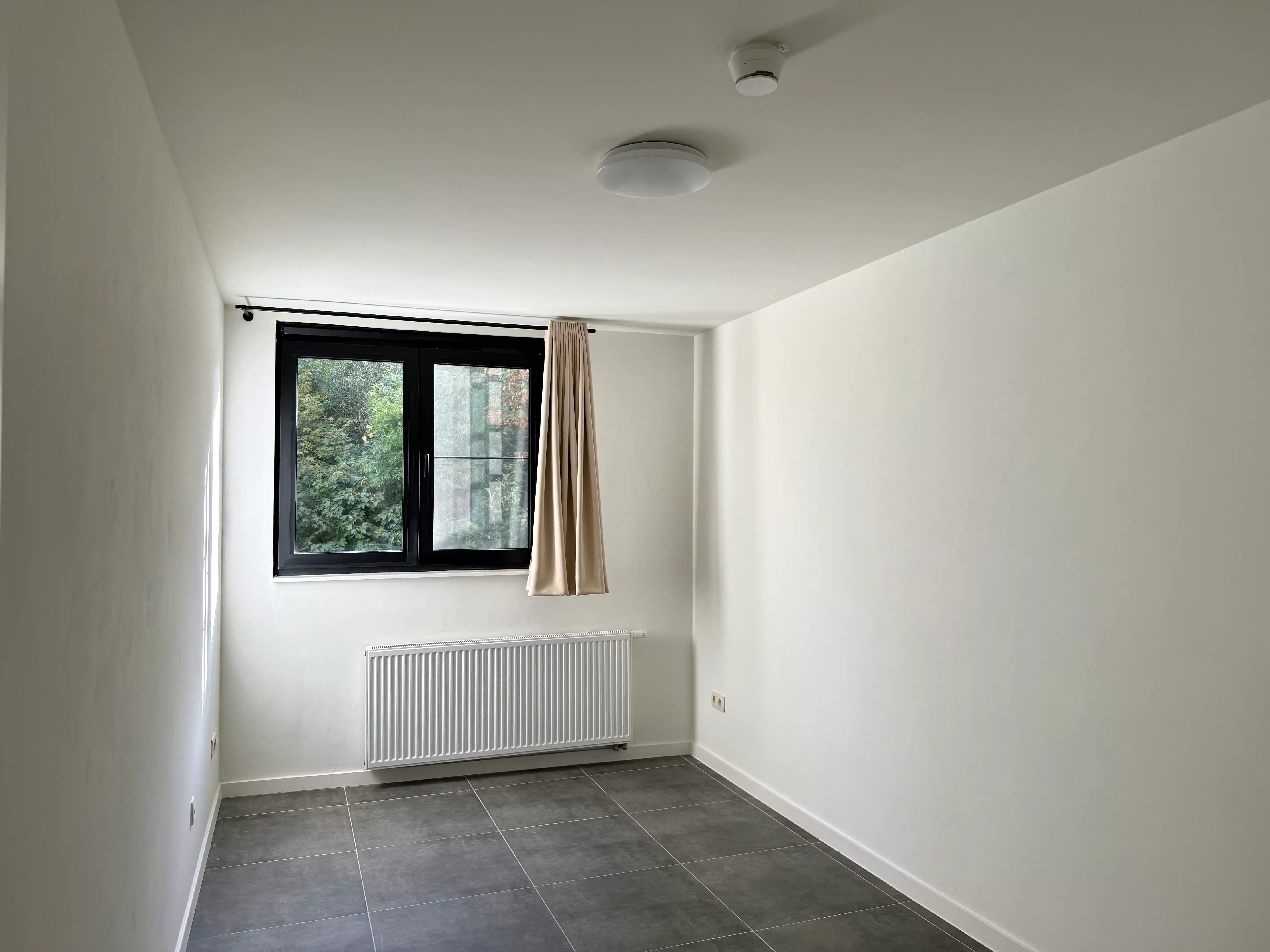 Ruim appartement met 4 slaapkamers en uitzonderlijk privatieve tuin foto 7