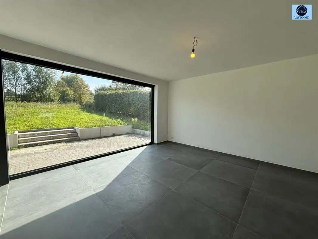 BEN-WONING MET ZONNIGE TUIN IN ONKERZELE foto 4