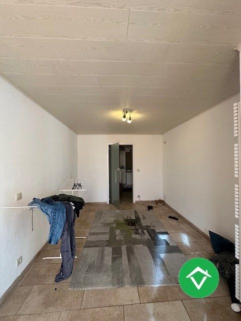 Instapklaar gelijkvloers appartement met tuin en garage in rustige wijk te Eernegem foto 12