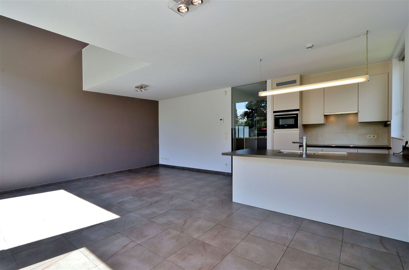 Woning te Lot foto 5