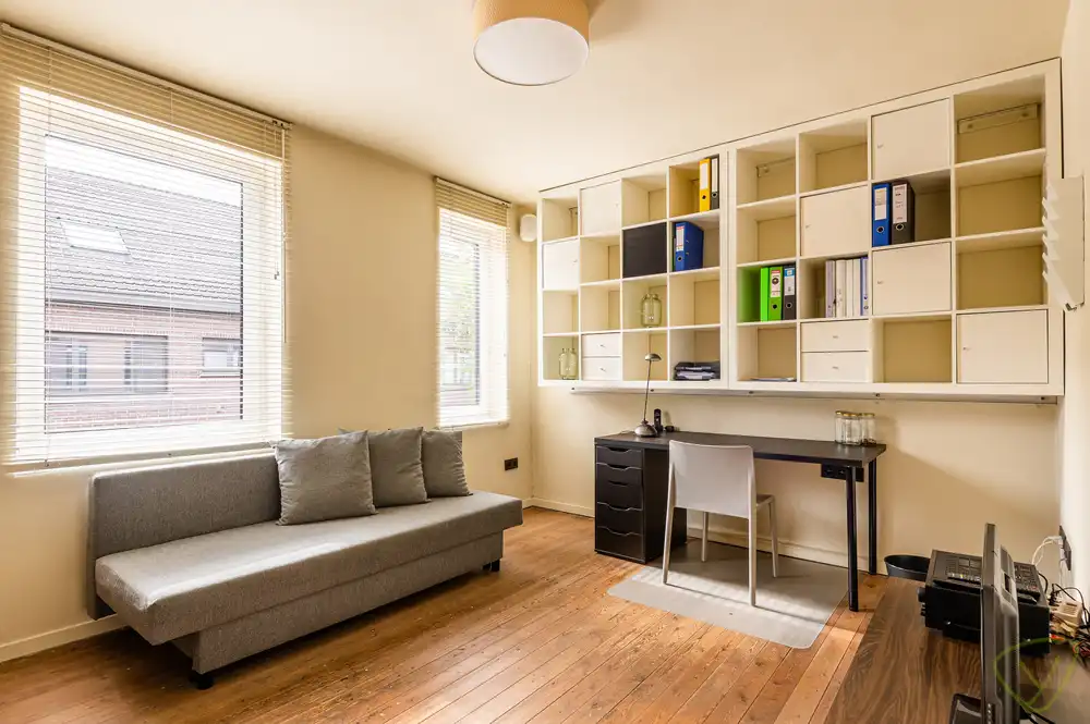 Ruime woning met zonnige tuin en veel potentieel in de Desire Goethalsstraat foto 13