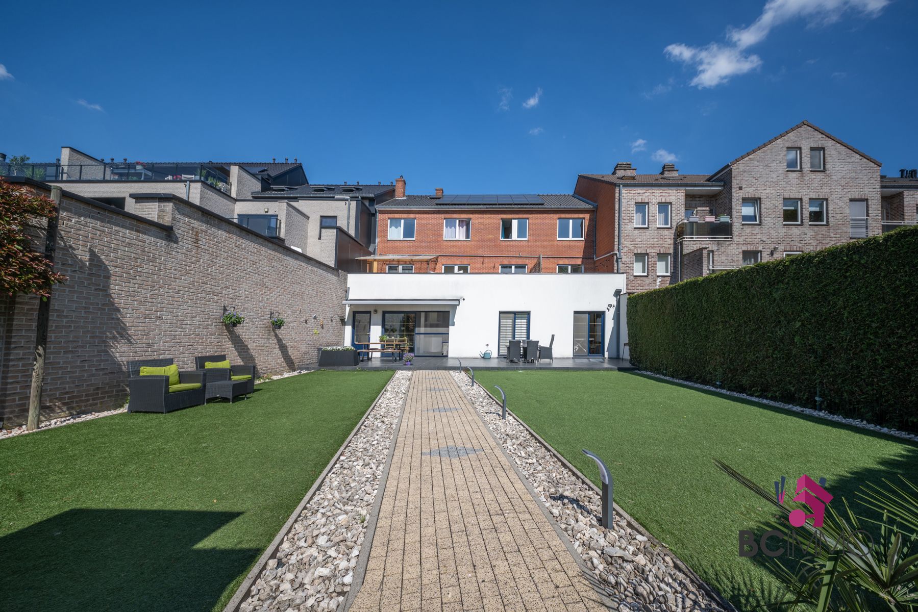 Instapklaar gelijkvloers appartement met tuin, dubbele garage en staanplaatsen te Genk foto 17