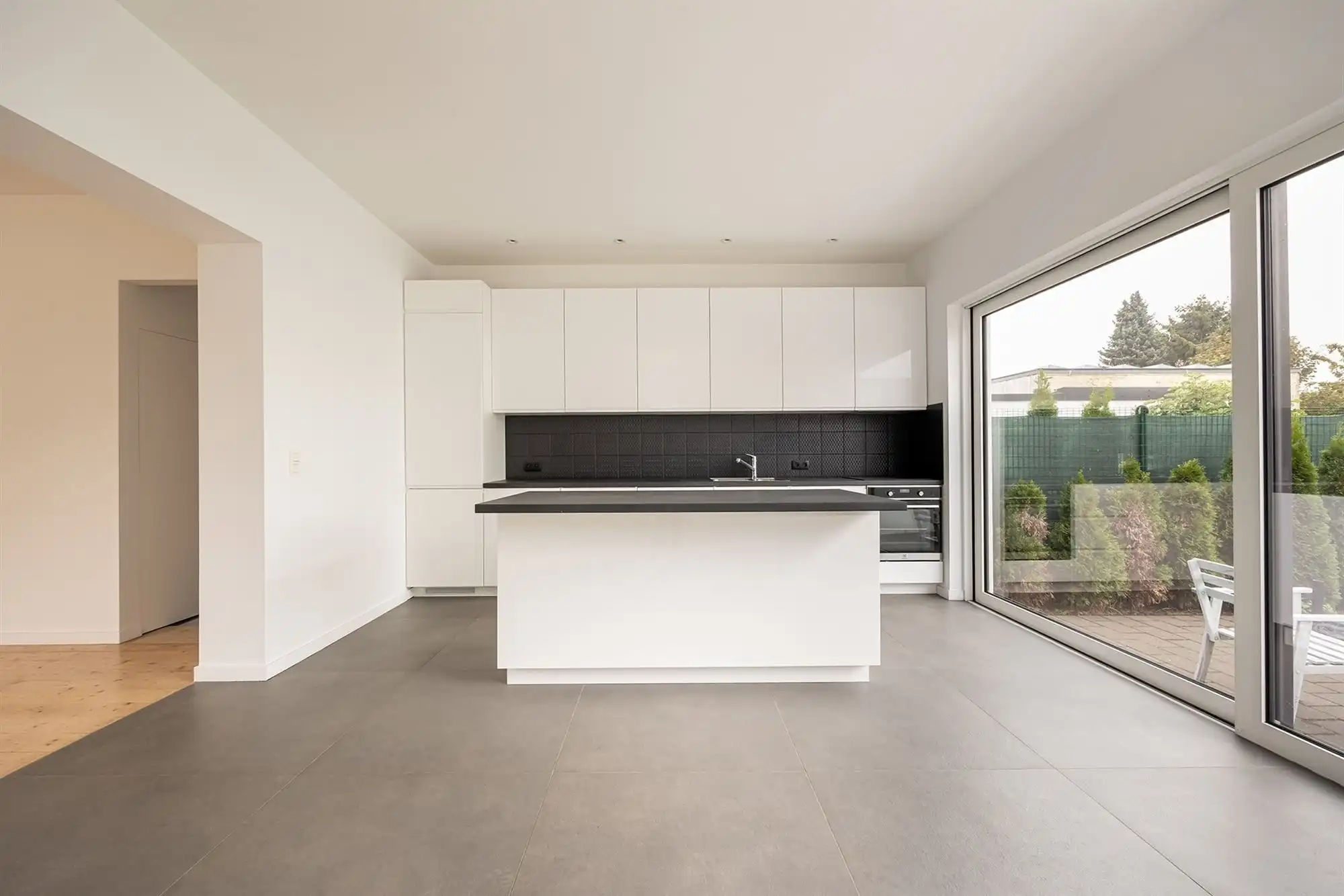 Ruime, energiezuinige woning met tuin in Rumst foto 7