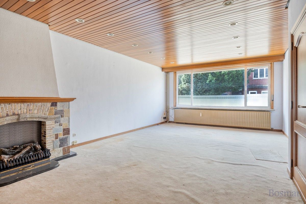 Halfopen bebouwing met 5 garageboxen te koop in Ham foto 5