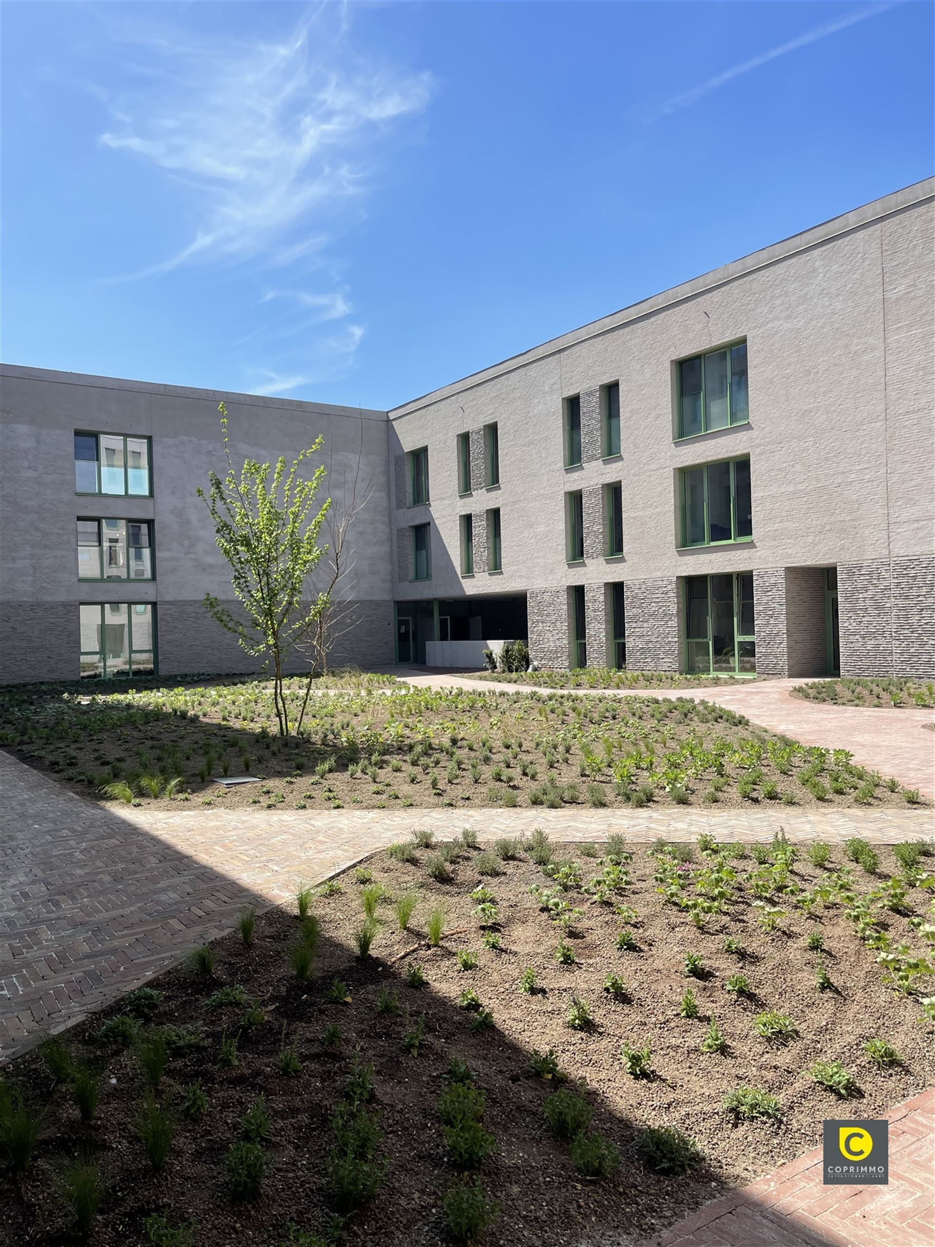 Nieuwbouw gelijkvloers 2 slpks appartement  foto {{pictureIndex}}