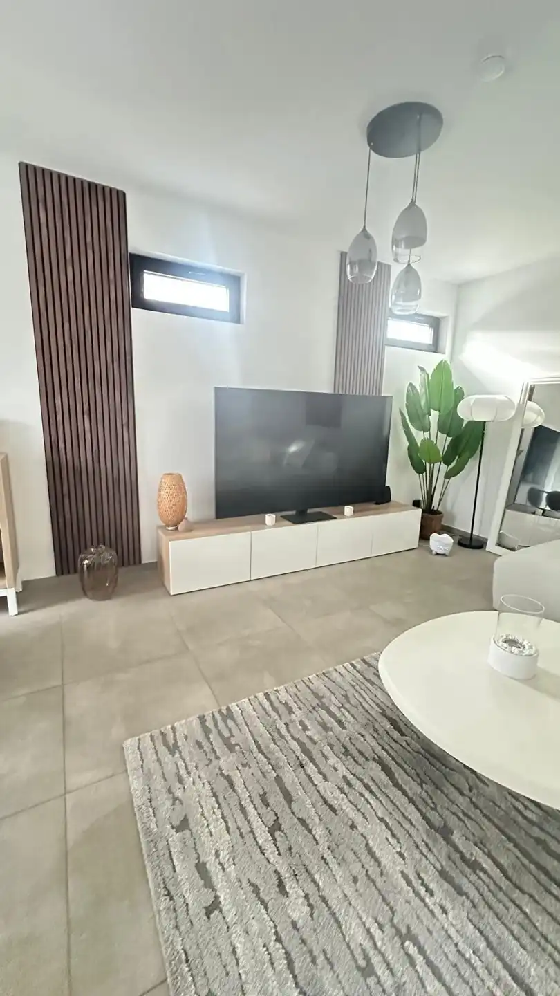 Modern nieuwbouwappartement met terras te huur foto 15