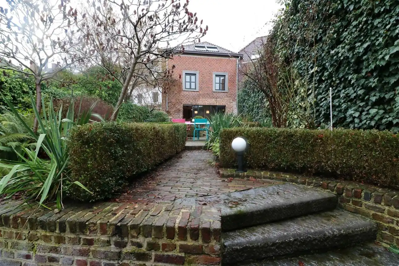 Voormalige patriciërswoning met 3 slpk., prachtige tuin en garage foto 4
