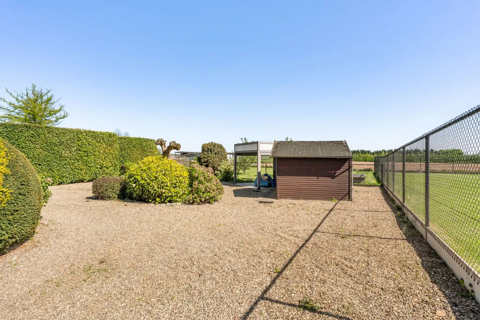 Gelijkvloerse gezinswoning op een ruim perceel van 9a51ca op een rustige locatie met uitzicht op achterliggende weilanden!  foto 24