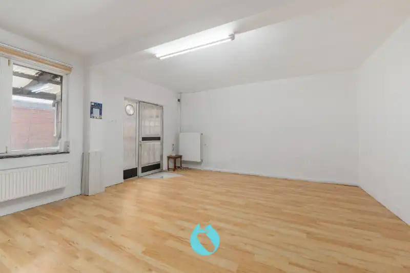 Te renoveren pand in tweede bouwlijn met private oprit en tuin foto 6