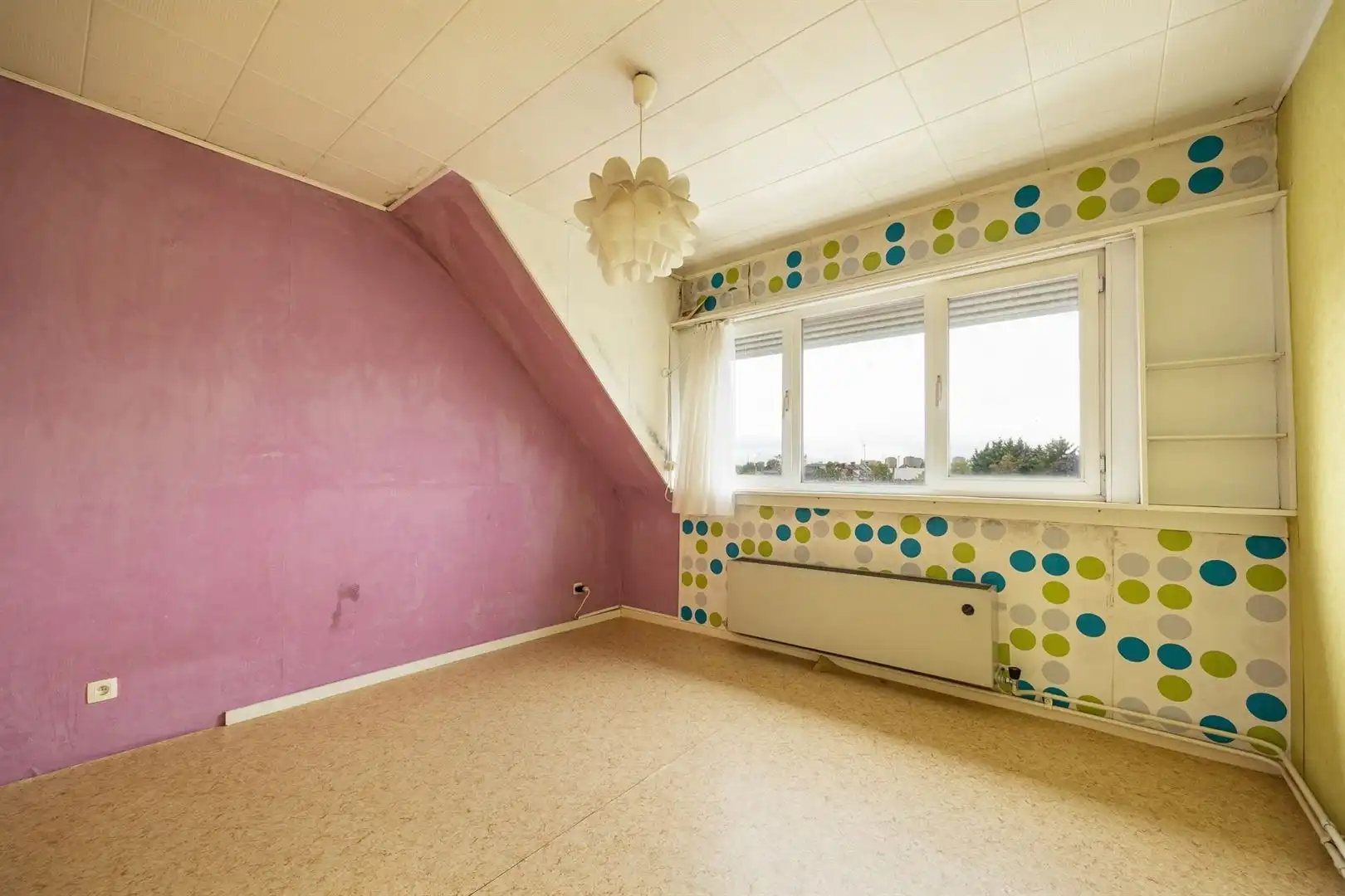 Ruime gezinswoning met zonnige tuin en renovatiepotentieel foto 21
