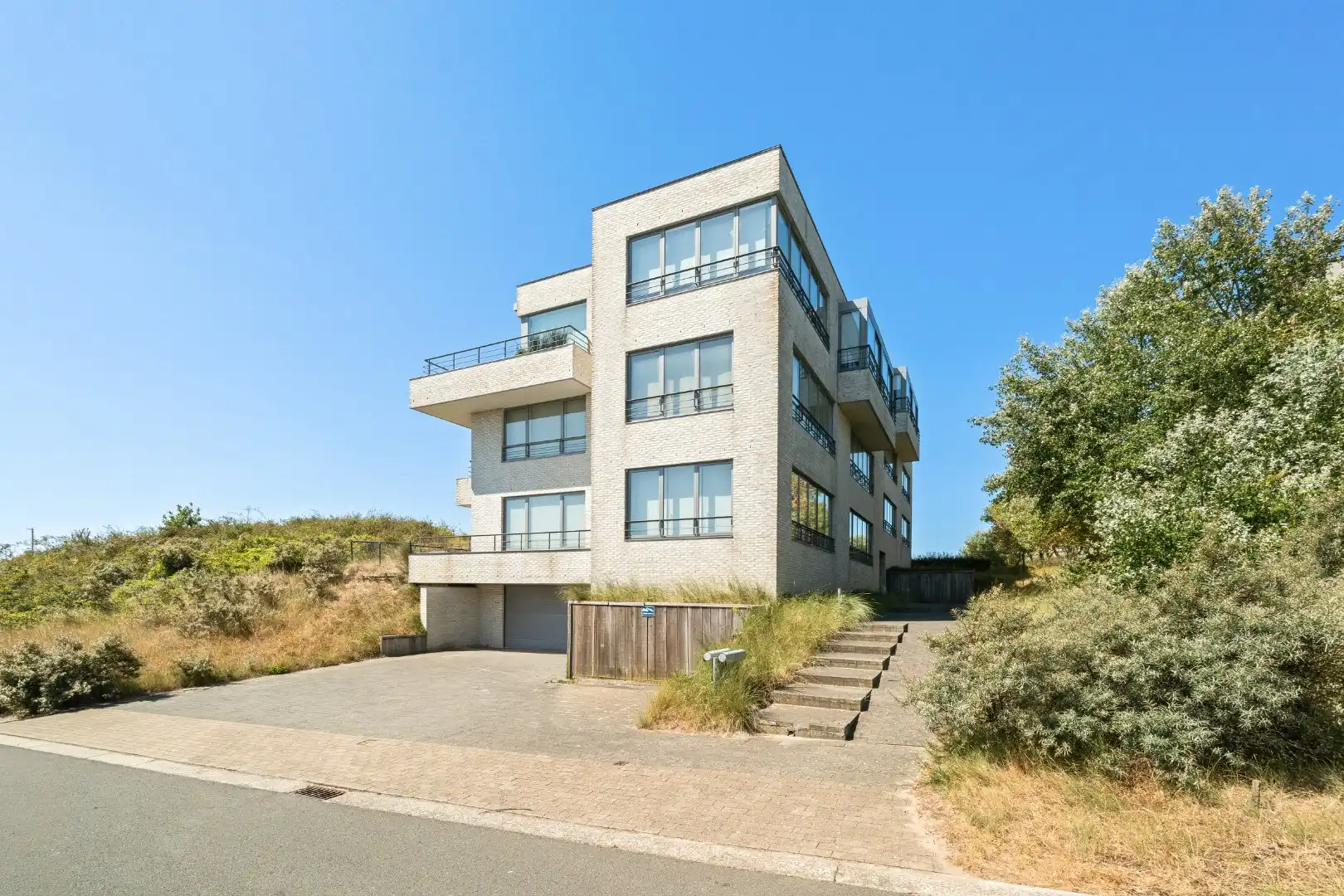 Exclusieve penthouse met zicht op duinen en zee  foto 14