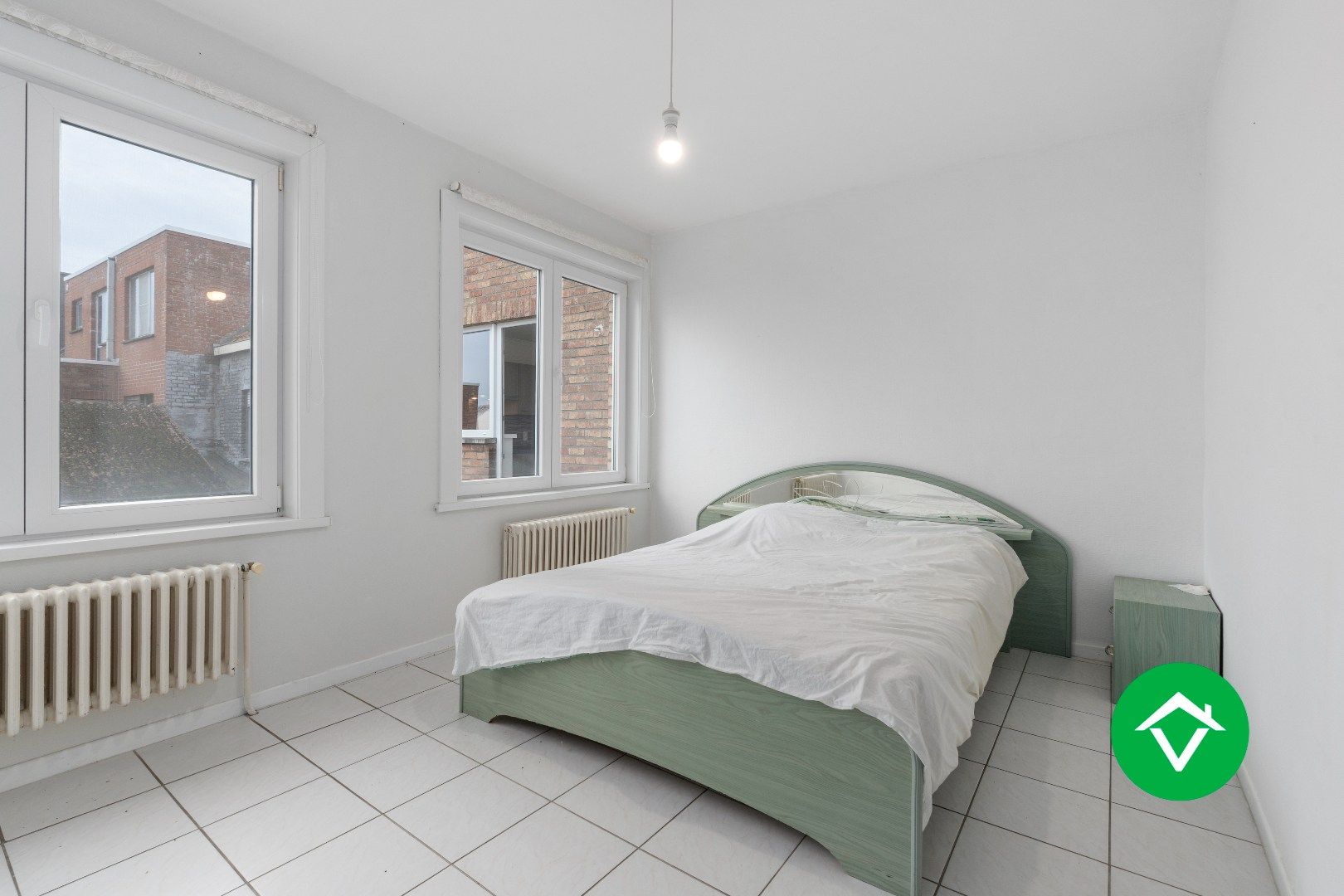 Veelzijdig handelspand met woonst en twee verhuurde appartementen in centrum Aartrijke foto 27