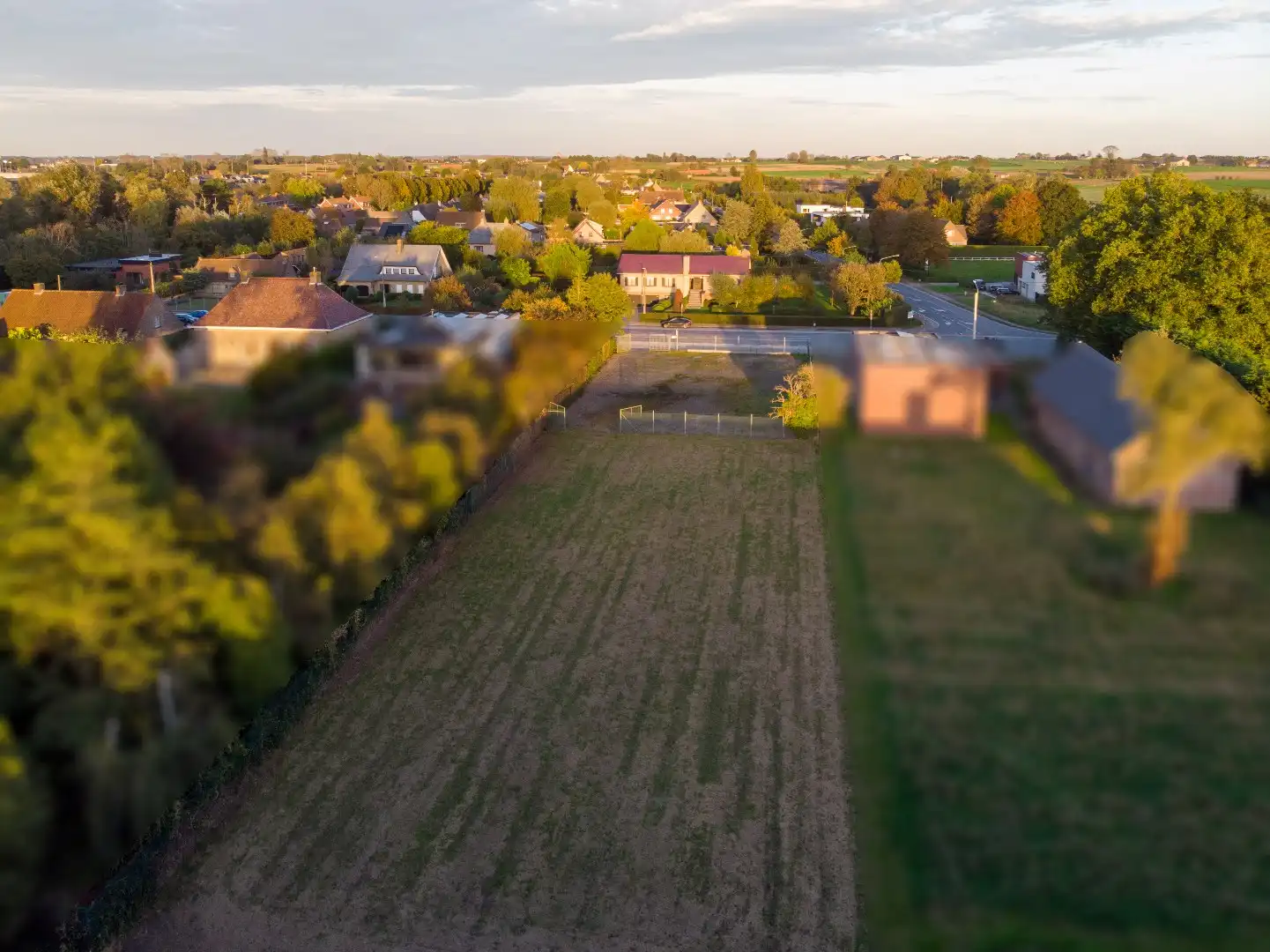 UPDATE: Residentieel gelegen stuk bouwgrond van 1500m² met aanpalend stuk groenzone van 1000m² foto 3