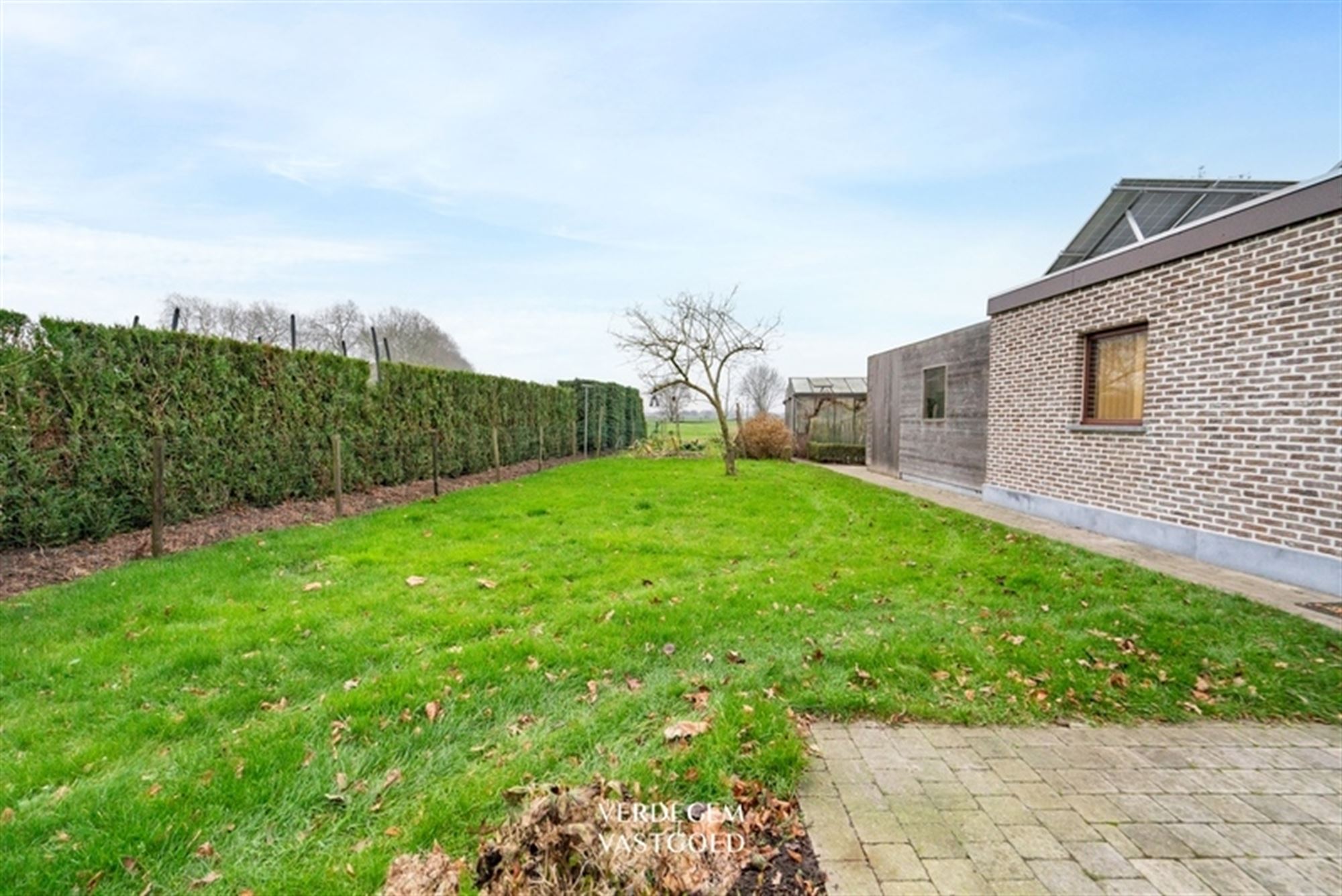 Instapklare familiewoning met 3 slaapkamers, ruime garage en zuidgerichte tuin foto 18