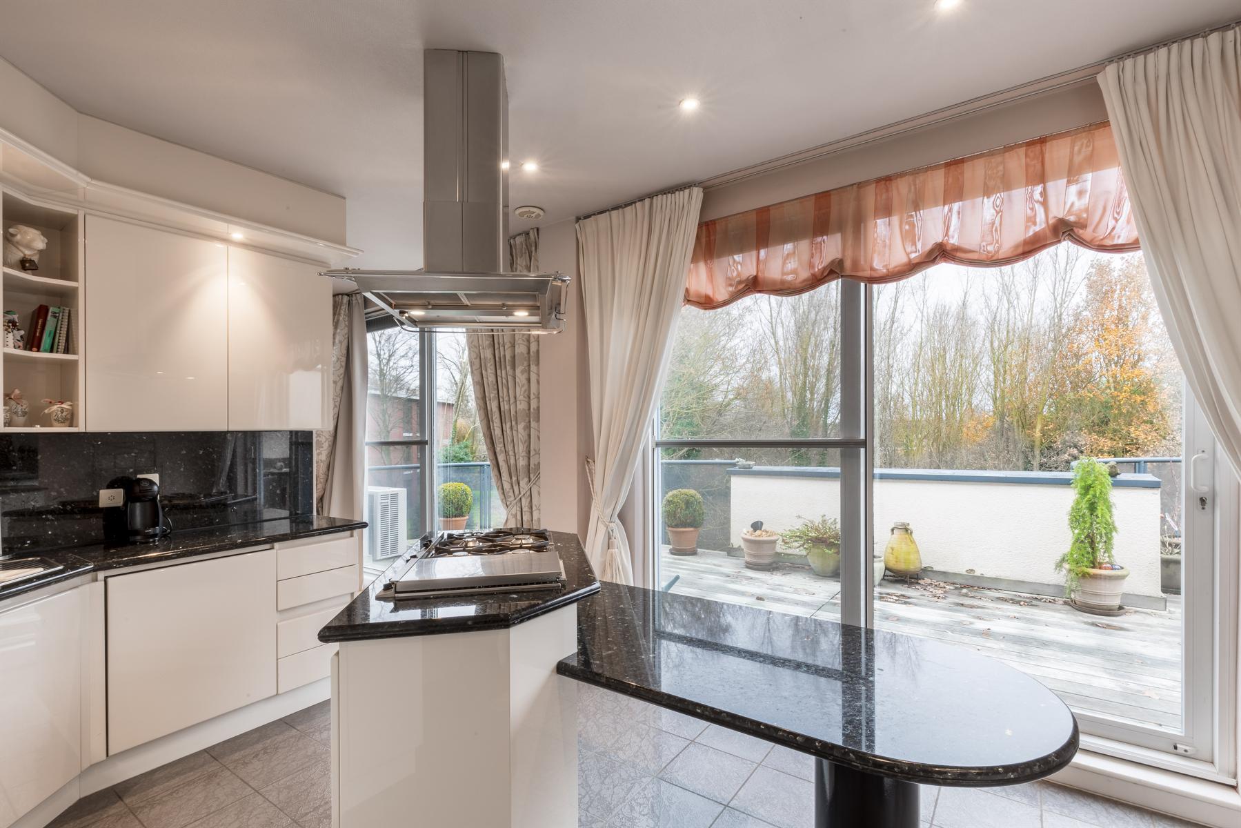 Riante penthouse met o.a. 3 slpks, 2 badks en ruime terrassen foto 8