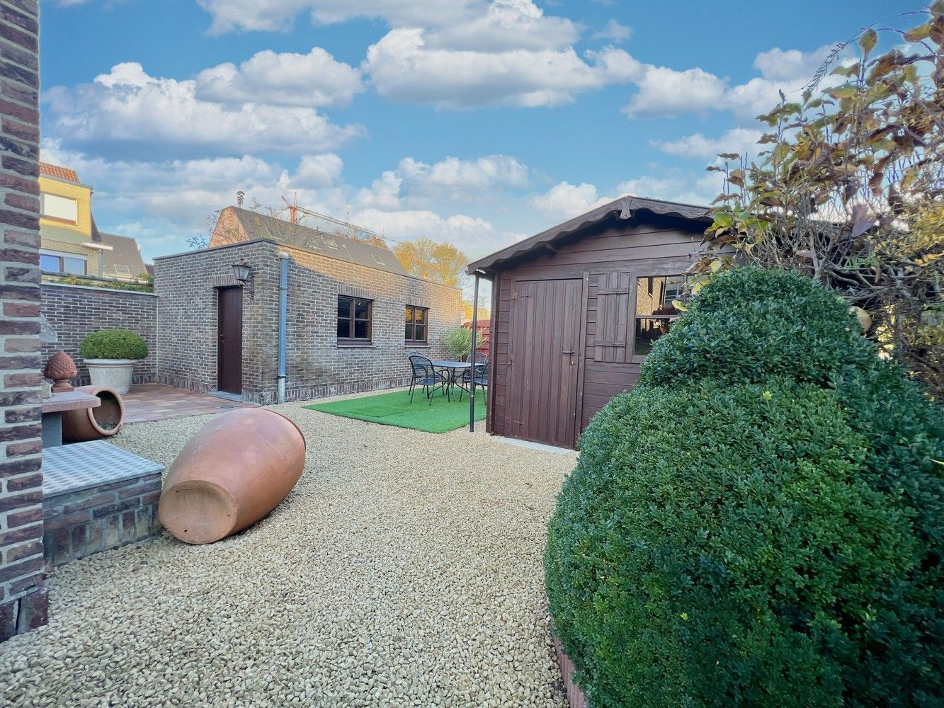 Topper! Stijlvolle woning met zonnige tuin + 2x garage foto 19