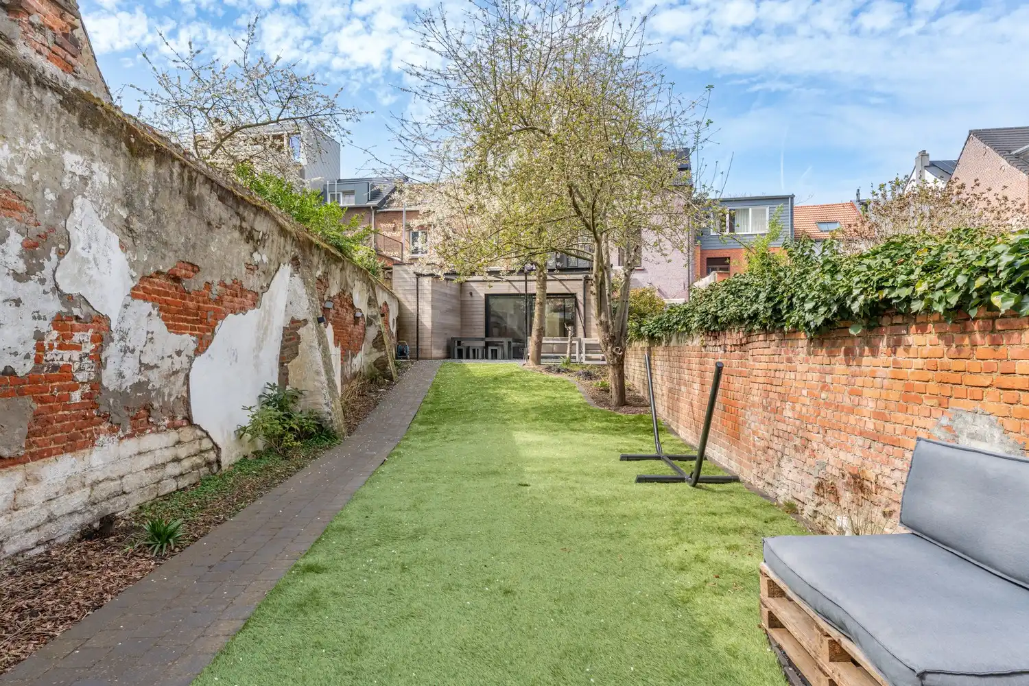 Gerenoveerde en energiezuinige woning met 4 slaapkamers en een tuin met een achteruitgang en een grote garage te centrum Leuven! foto 11