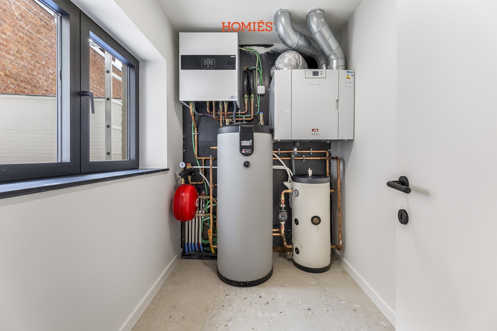 Luxueus en energiezuinig gelijkvloersappartement met stadskoer foto 14