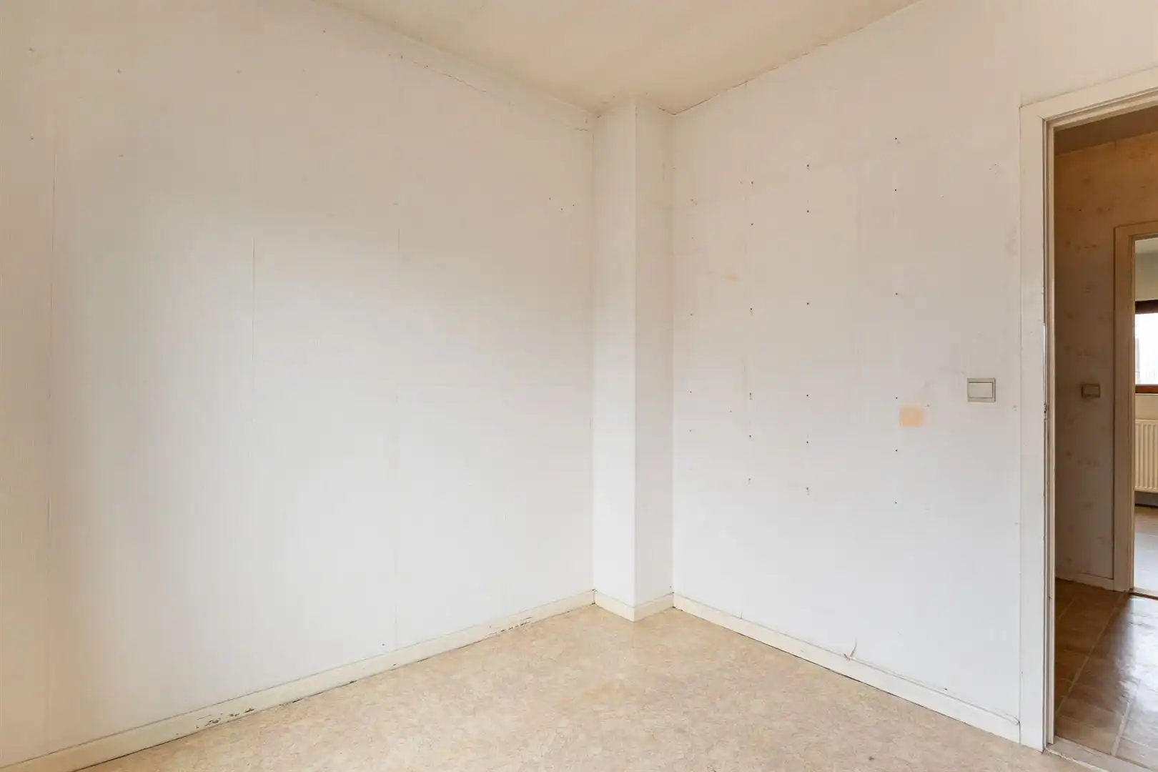 Te renoveren gezinswoning met tuin en garage in rustige centrumstraat foto 16