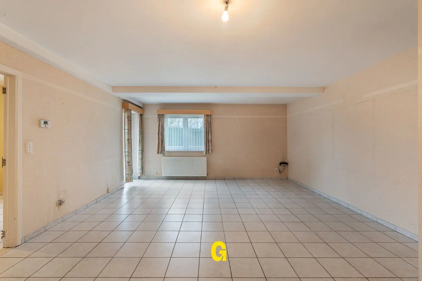 Degelijk (rolstoelvriendelijk) gelijkvoersappartement met terras uitgevend op de tuin, afsluitbare garage en berging foto 11