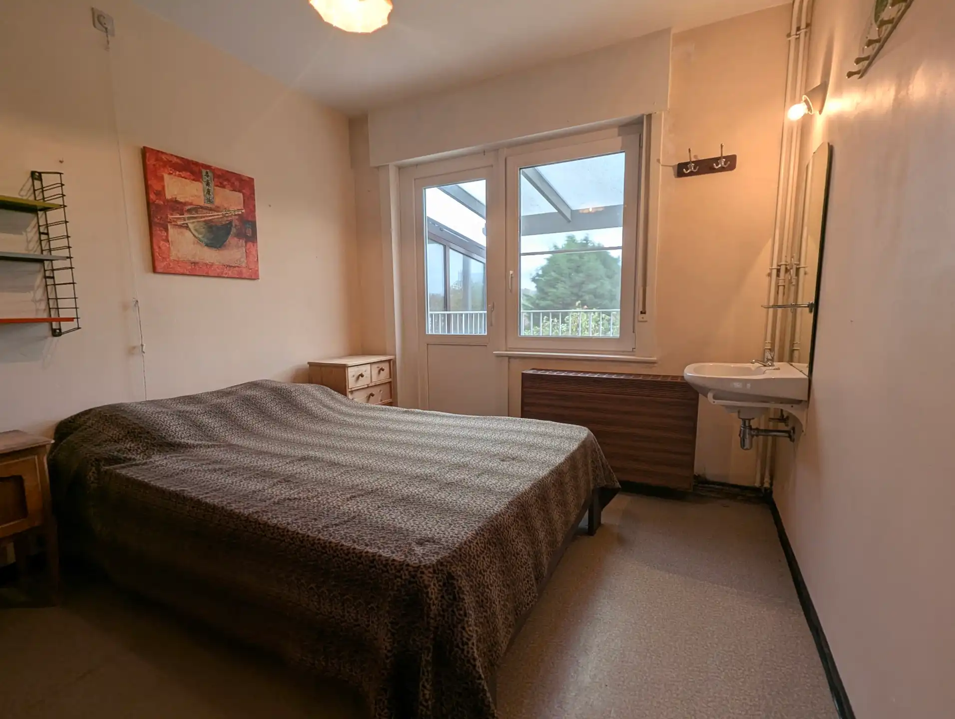 Ruime woning met zongerichte tuin te koop. Centrum De Panne aan zee. foto 11