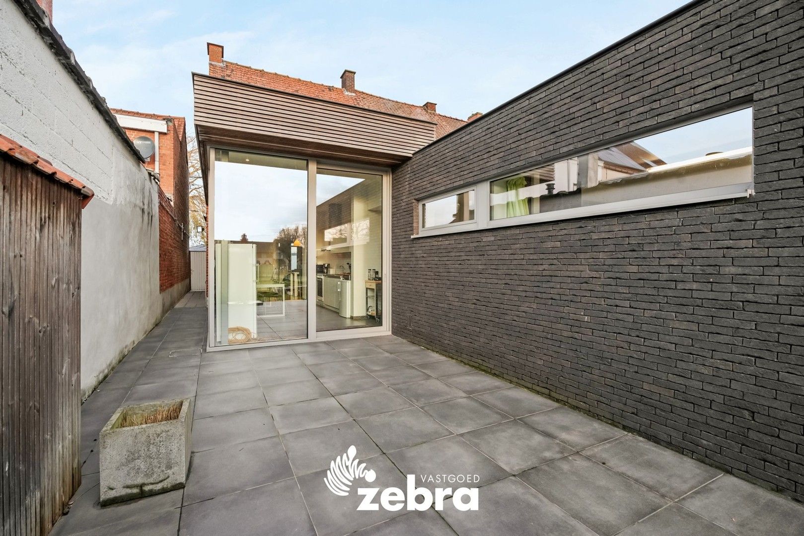 Ruime woning met mogelijkheid tot 4 slaapkamers te Roeselare! foto 2