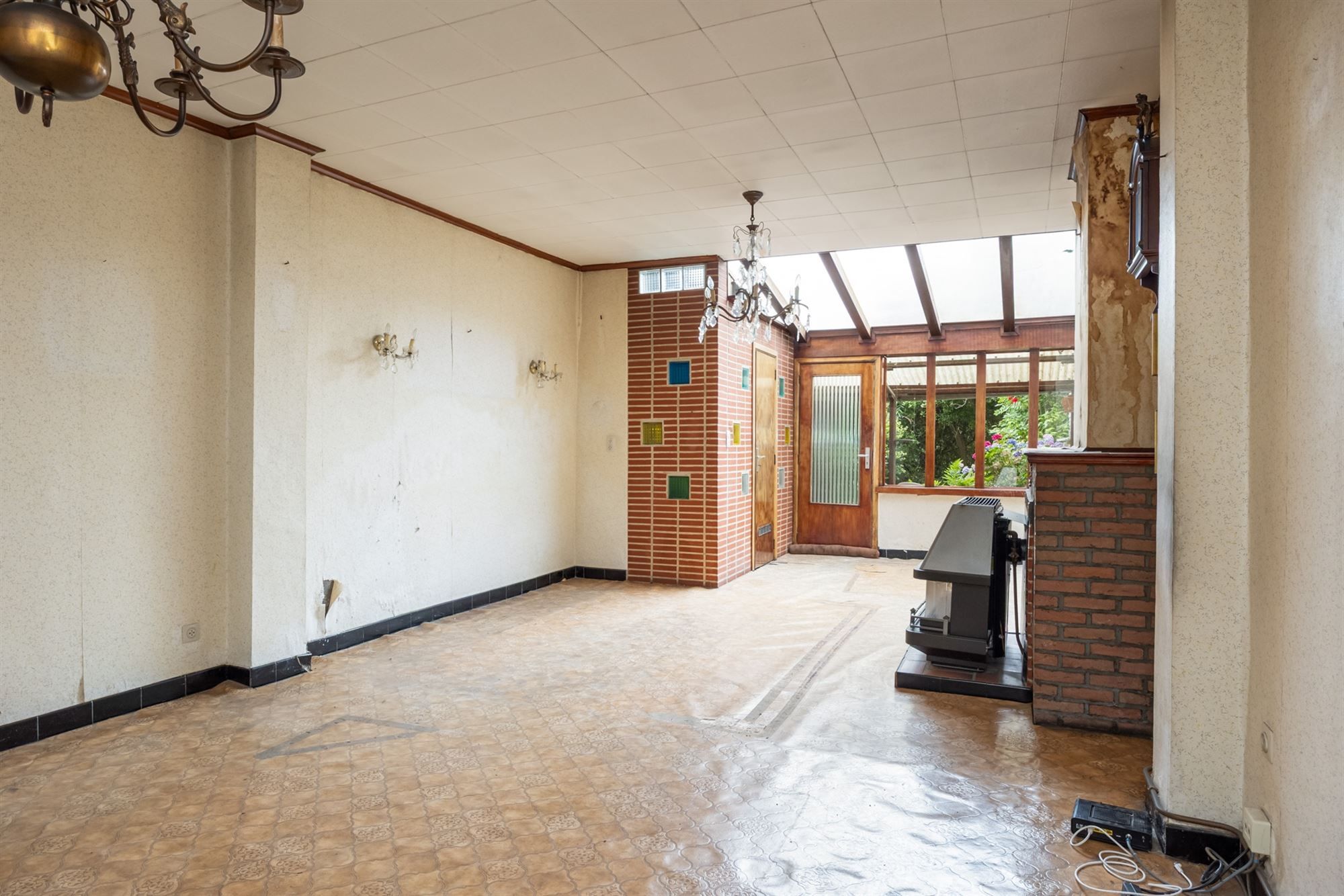 Te renoveren woning met tuin op toplocatie in Mechelen foto 4