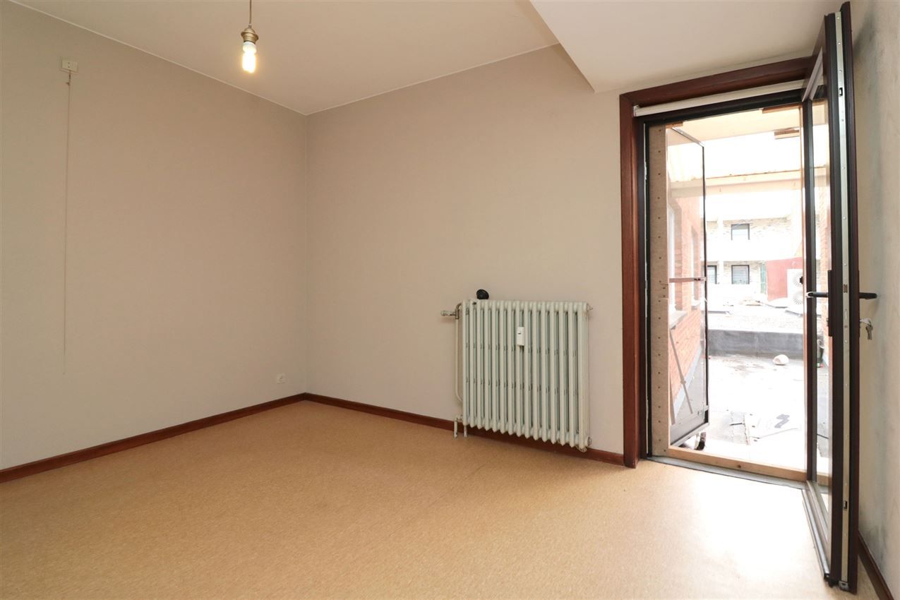 Opbrengsteigendom (handel & 4 app) op toplocatie foto 134