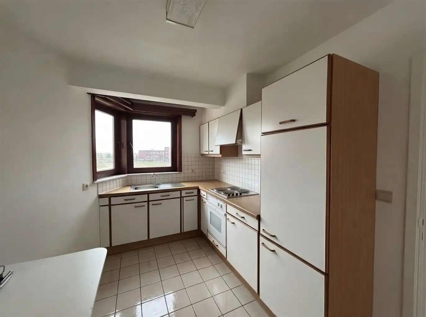 Gezellig appartement met 2 slaapkamers en terrasje nabij het centrum van Maaseik. foto 3