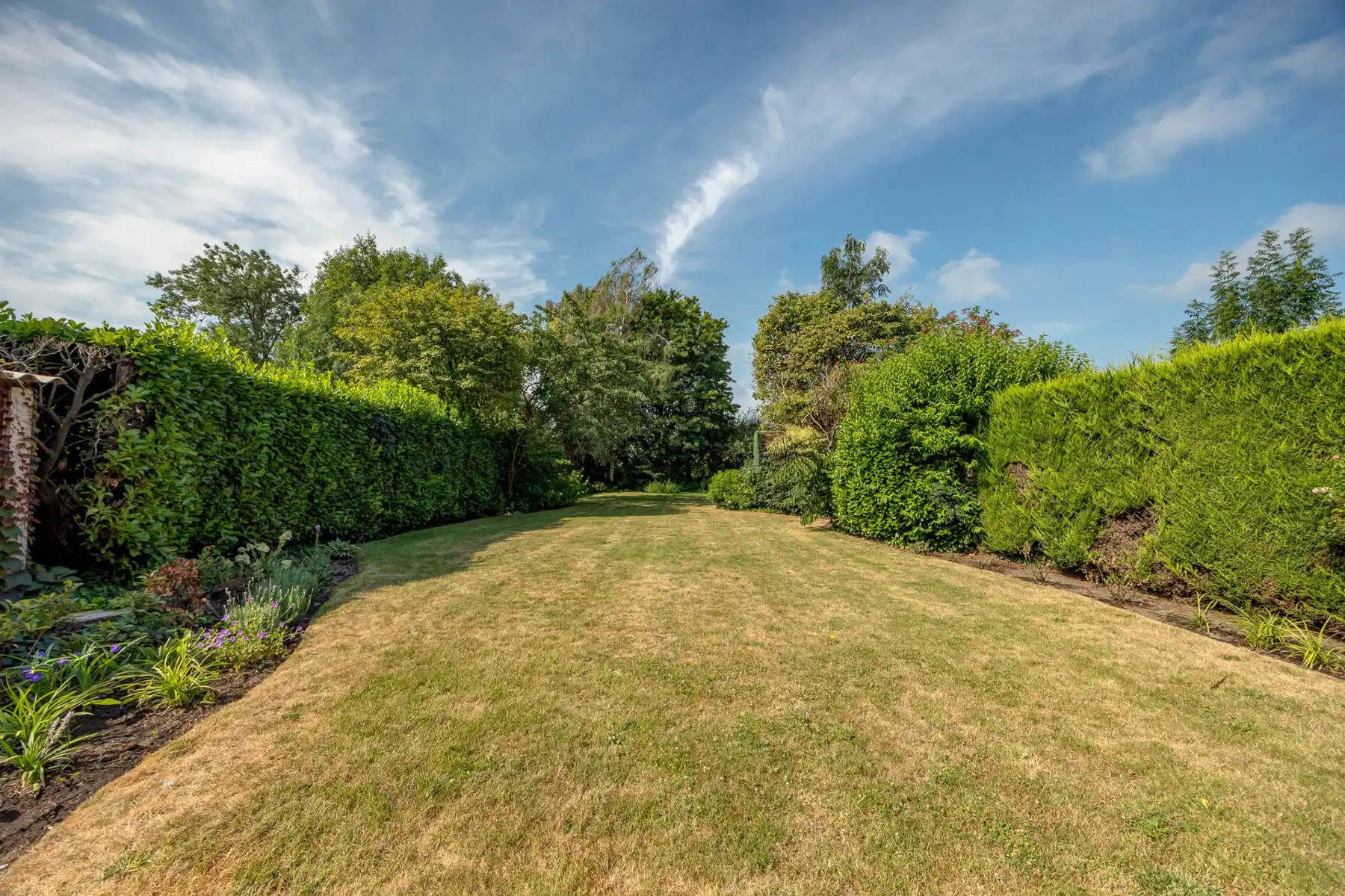 Halfopen bebouwing met garage en zuidwest-tuin! foto 15