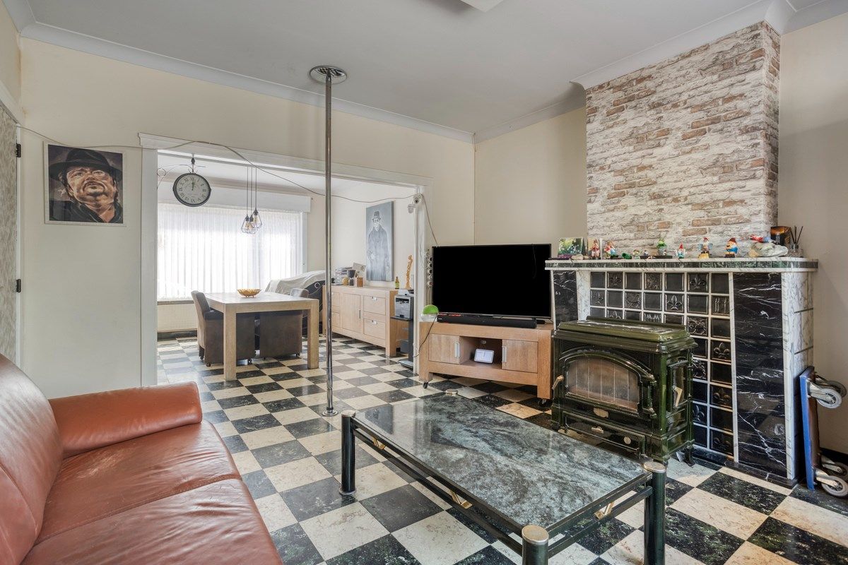 Te renoveren woning met naastliggend bouwperceel! foto 6