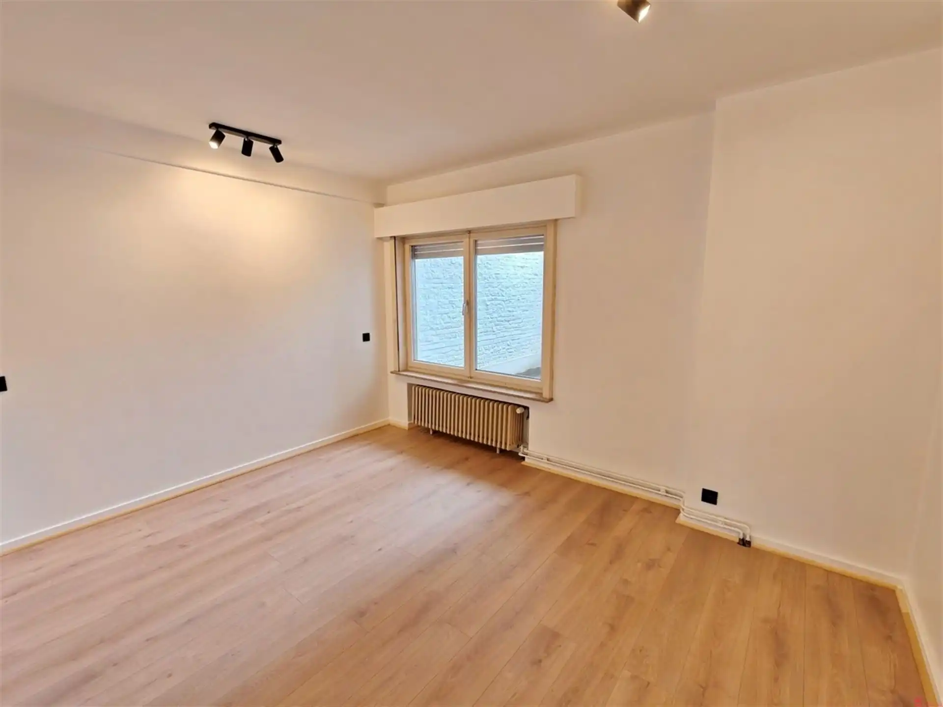 Instapklaar gelijkvloers appartement in hartje Kortrijk foto 9