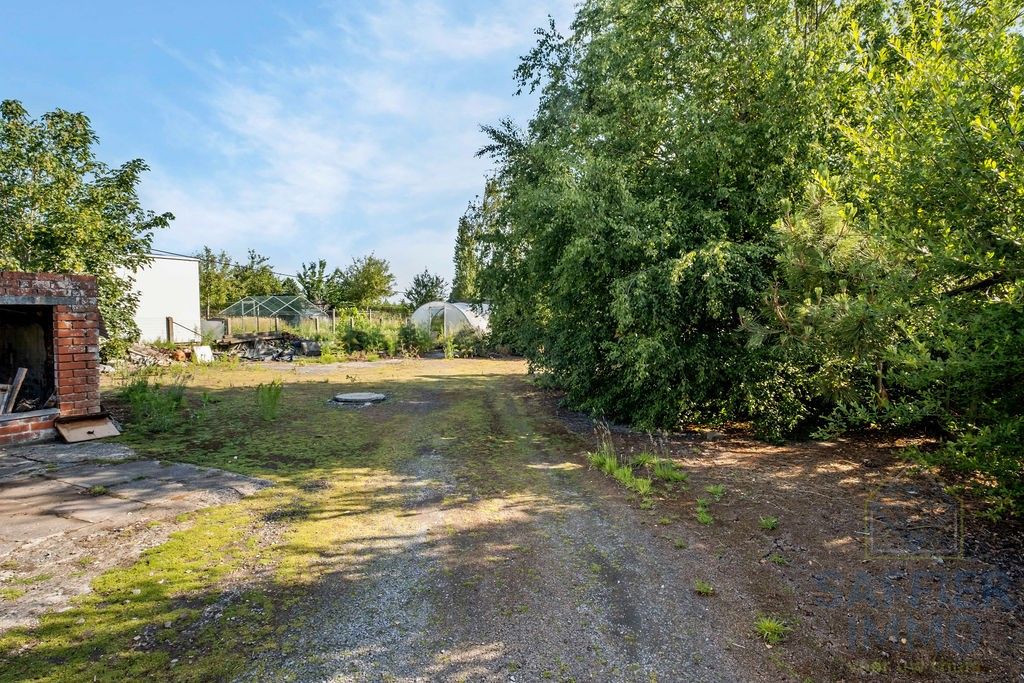 Ruime woning met loods op een perceel van 2200m². foto 6