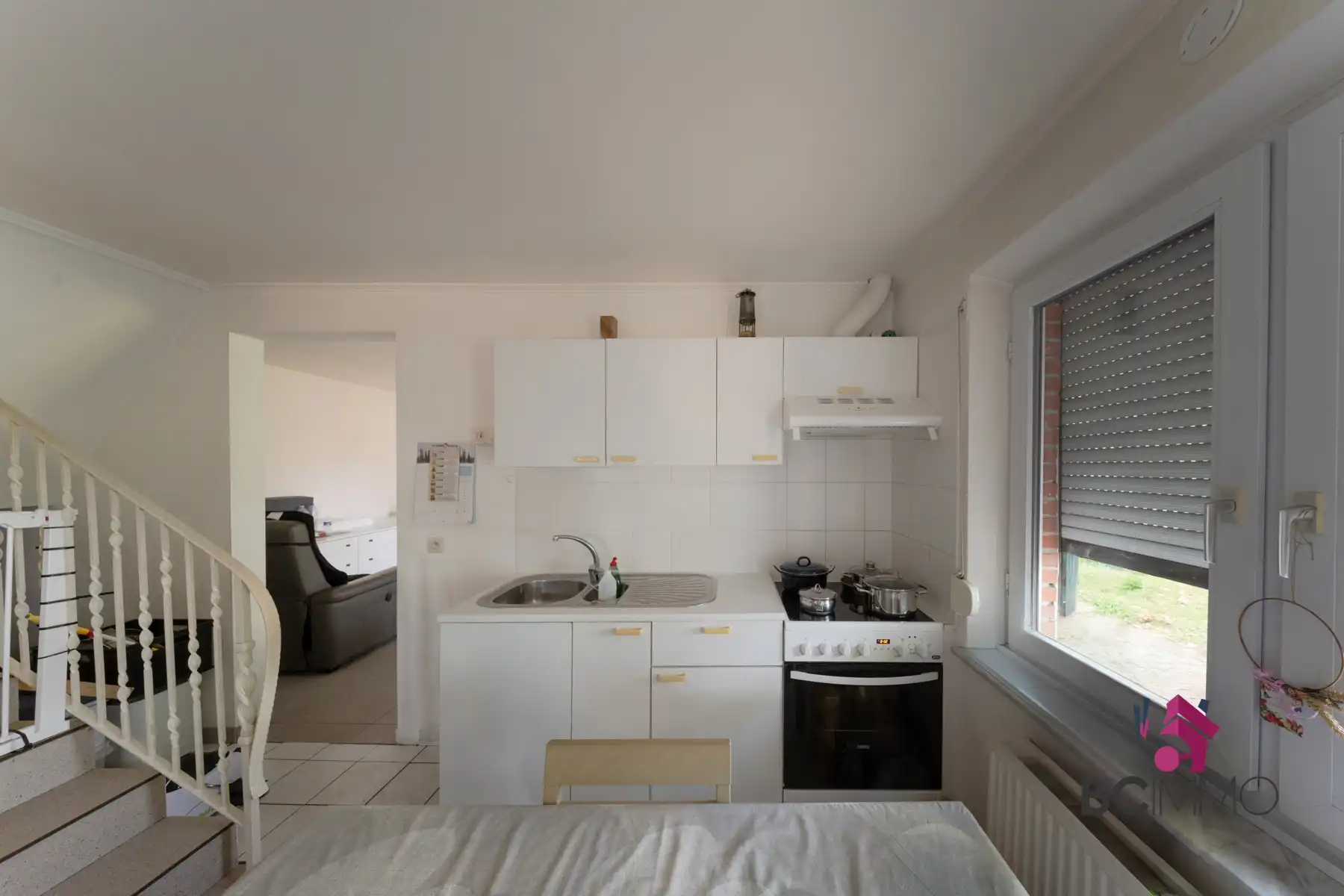 Halfopen bebouwing met twee woongedeeltes (125 m² + 95 m²) en tuin. foto 14