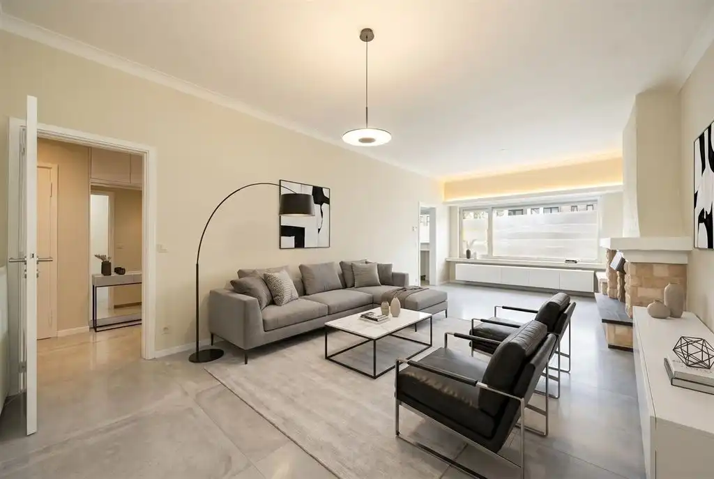 Instapklaar gelijkvloersappartement met stadskoer foto {{pictureIndex}}