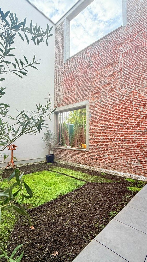 Modern gelijkvloers appartement met 1 slaapkamer en ruim terras/tuin in hartje Lanaken foto 3