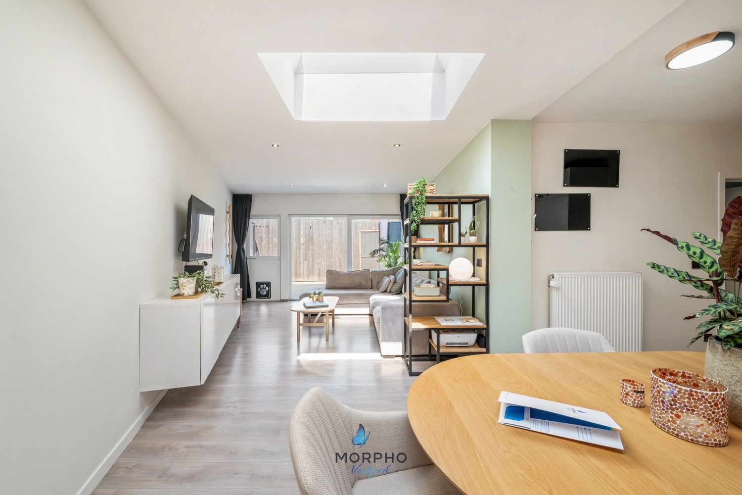 Instapklaar gelijkvloers appartement met 2 slpks, zonneterras en autostaanplaats. foto 4